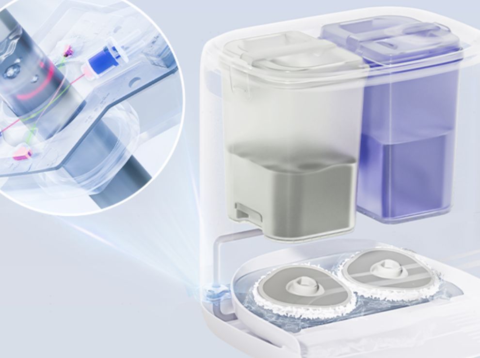 Close-up of the Narwal Freo X Ultra robot vacuum and mop’s self-cleaning system, showcasing the water tank and rotating mops.